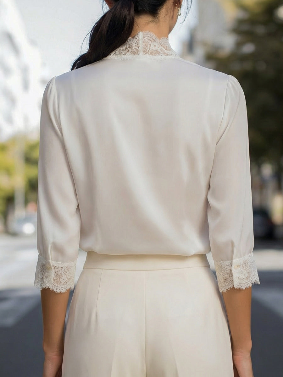 Blouse en chiffon à col en V avec dentelle et fermeture boutonnée