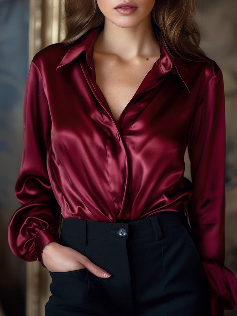 Blouse élégante en satin noir à manches longues