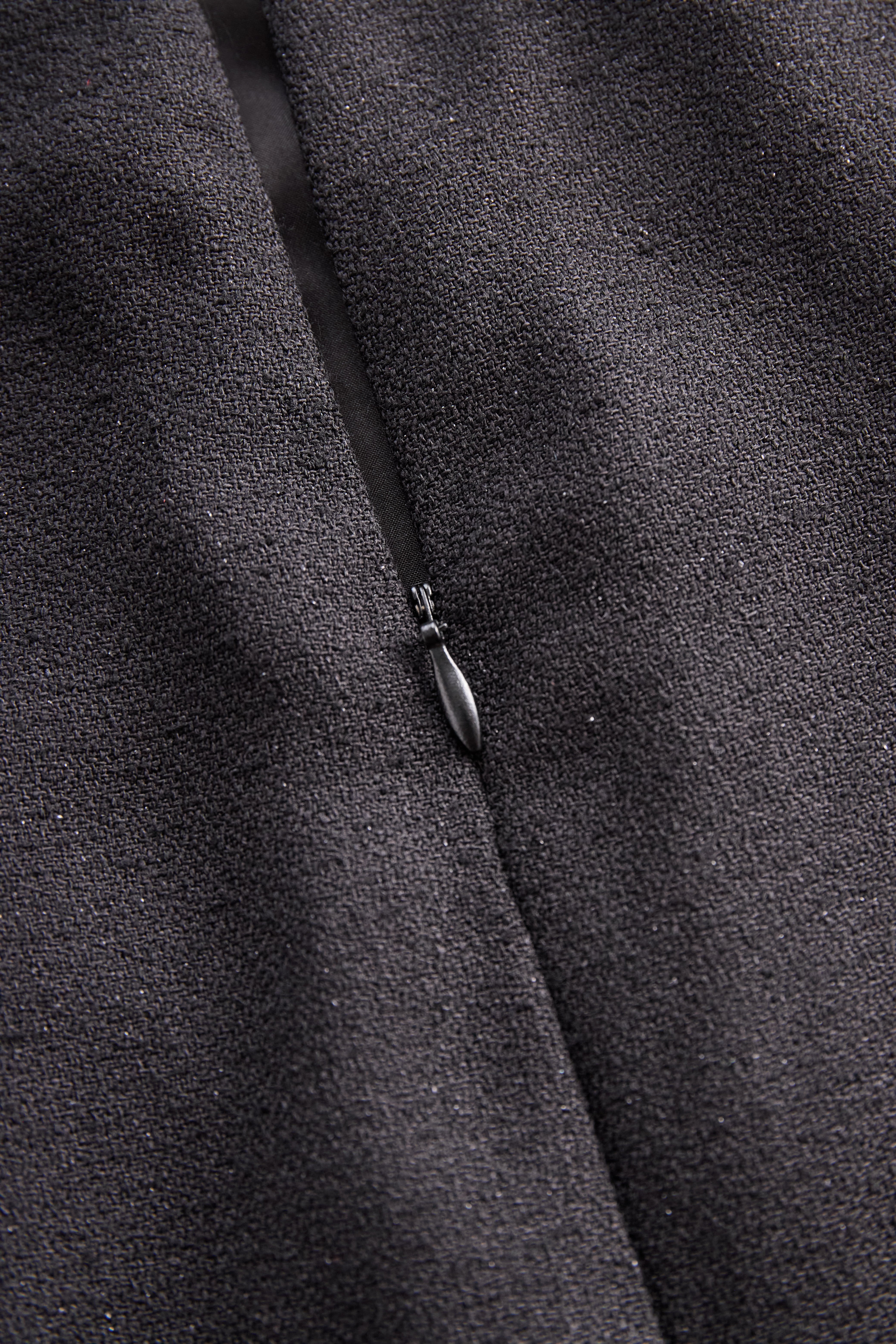 Ensemble deux pièces avec gilet à boutons perles et jupe longue