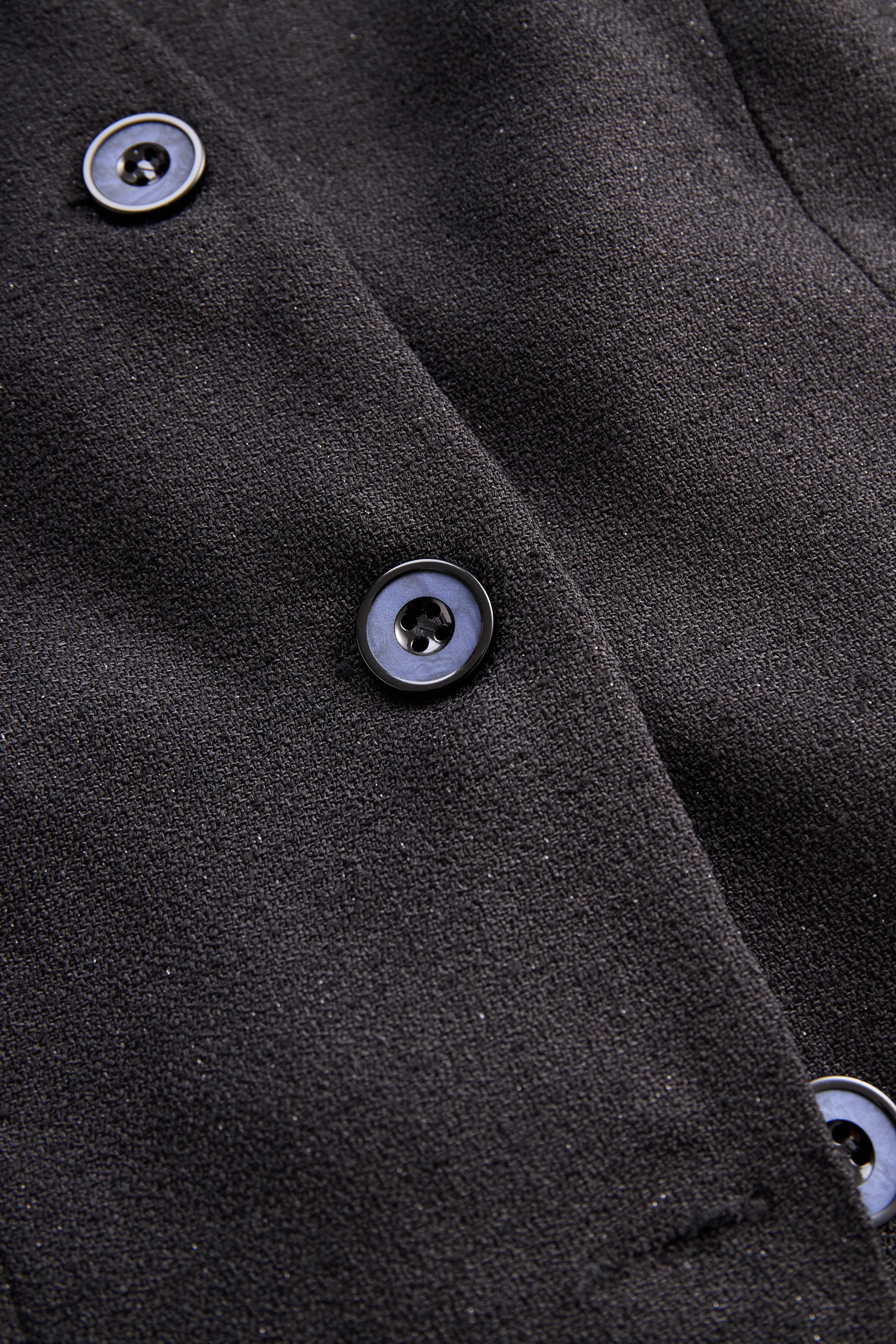 Ensemble deux pièces avec gilet à boutons perles et jupe longue