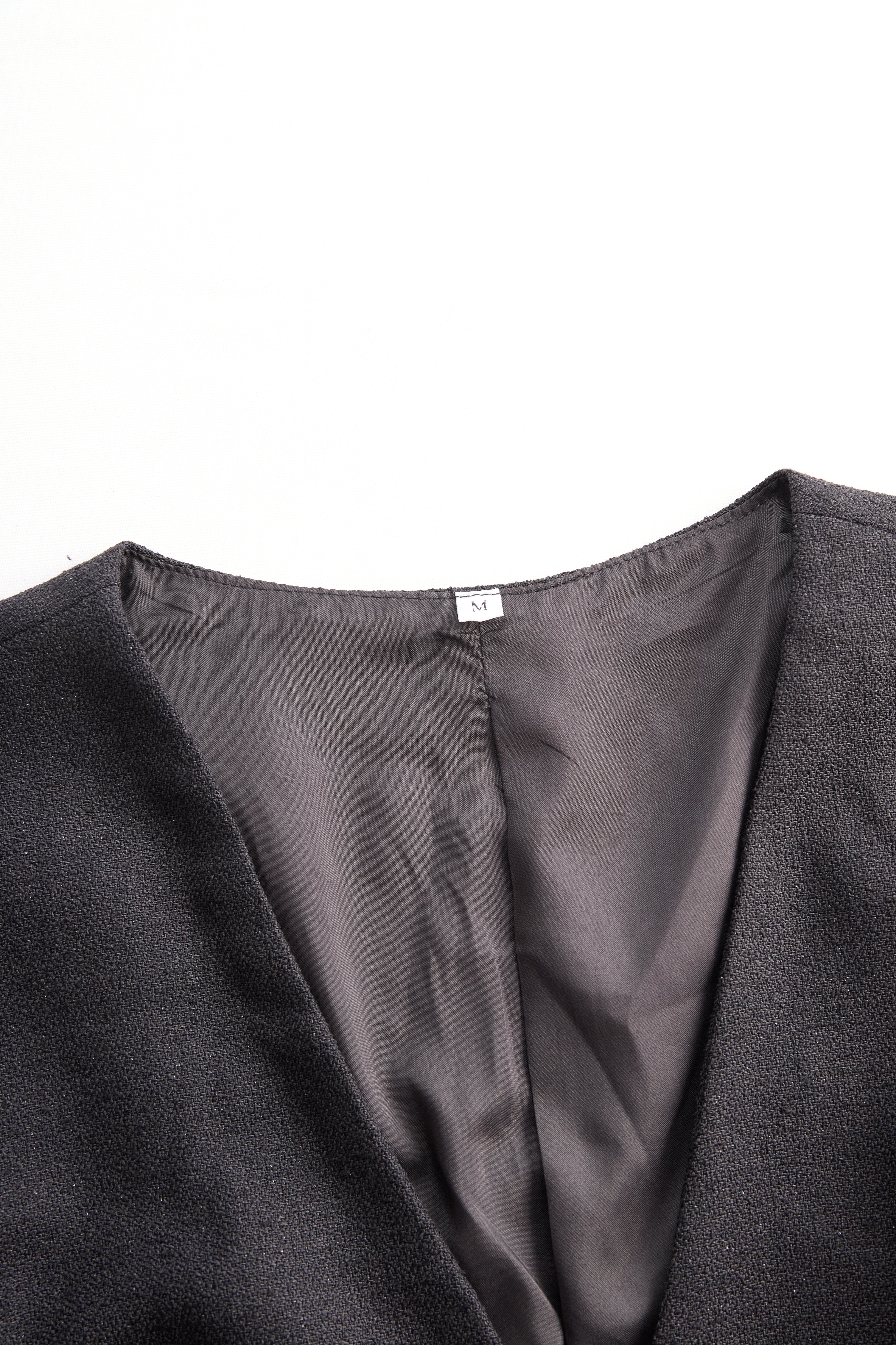 Ensemble deux pièces avec gilet à boutons perles et jupe longue