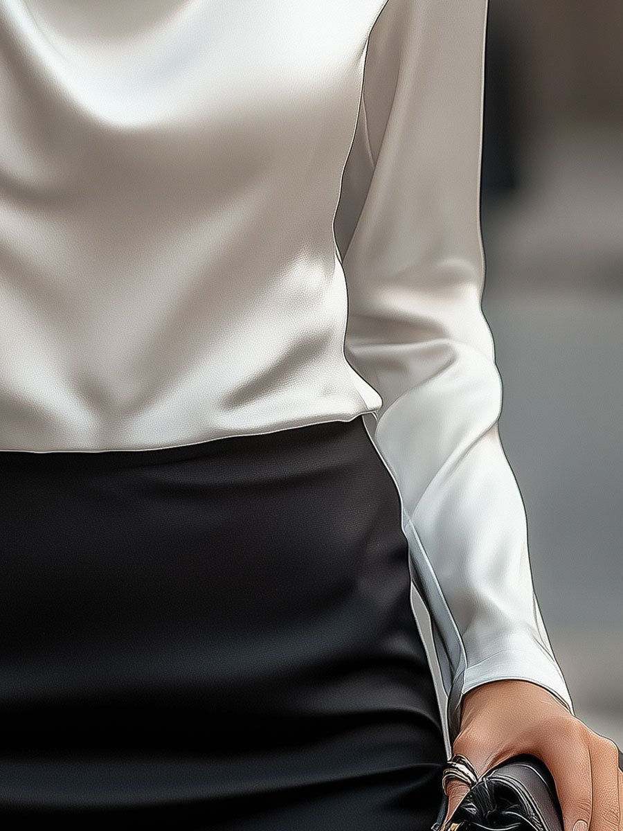 Blouse élégante en satin blanc avec encolure drapée